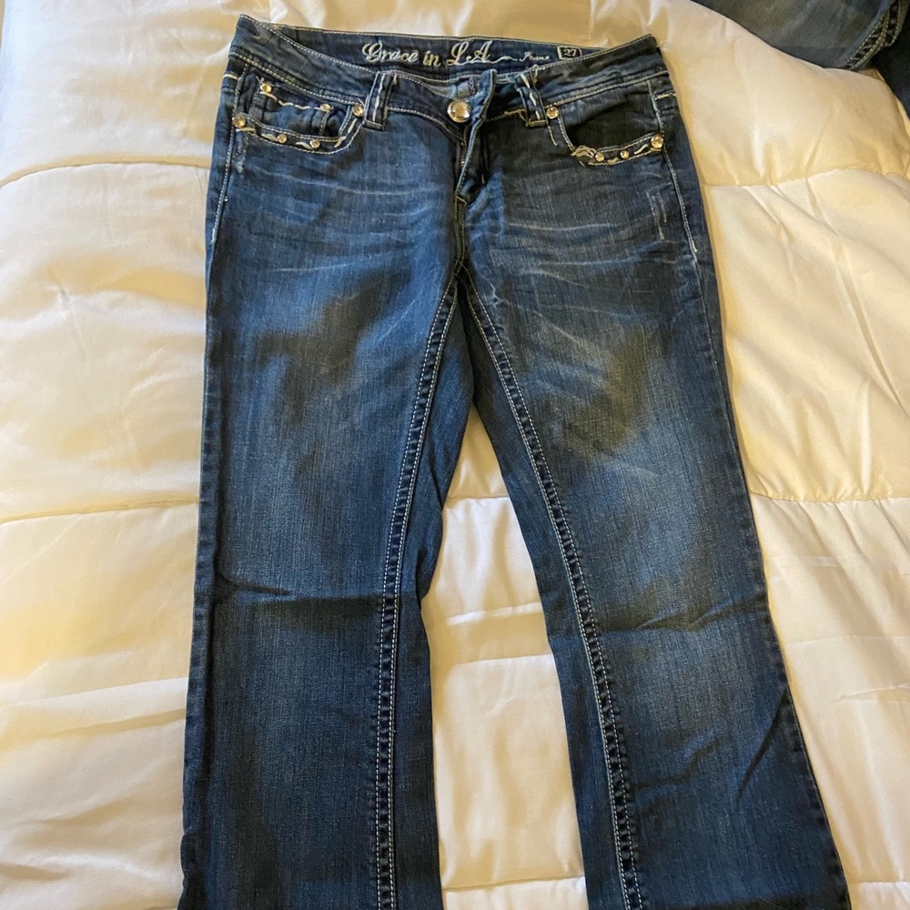 Grace in LA low rise boot cut jeans